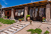 Hand-woven weavings for sale at a home weaving shop in Seclantas, Argentina in the Calchaqui Valley.