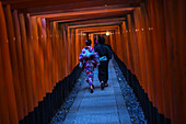 Exploring Fushimi Inari Taisha temple at night, Kyoto, Japan