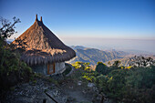 Kogihabs (individual huts, inspired by the architecture of the kogui indigenous tribe) at El Dorado Nature Reserve Lodge with views of the Sierra Nevada de Santa Marta and its legendary sunsets over the Caribbean Sea, Colombia