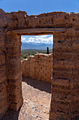 Adobe ruins at the Mirador de la Ventanita de los Valles Calchaquies between Cardones National Park & Payogasta, Argentina. The snow-capped Nevado de Cachi is framed by the doorway.