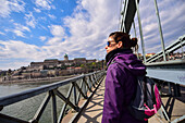 Szechenyi Chain Bridge in Budapest Young woman on Szechenyi Chain Bridge in Budapest