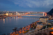 Erszebet and Szabadsag Bridge over river Danube at sunset, Budapest, Hungary