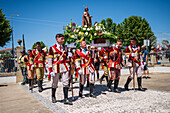 Religious procession enters São João Baptista Church during the Festival of Saint John of Sobrado, also known as Bugiada and Mouriscada de Sobrado, takes place in the form of a fight between Moors and Christians , locally known as Mourisqueiros and Bugios, Sao Joao de Sobrado, Portugal