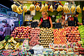 Barcelona, Spain, Sept 4 2008, Colorful fruit stall showcases a variety of fresh produce in Mercat de la Boqueria, with locals shopping for ingredients in Barcelona.