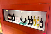 Local wines from the Calchaqui Valley on display in the shop in the Museo de la Vid y el Vino in Cafayate, Argentina.