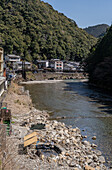 Visitors to the natural Onsen hot springs along the Kumano Kodo ancient pilgrimage route near Hongu, Honshu,  Japan, Asia