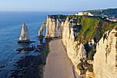 Chalk cliffs with arch and l'Aiguille (the Needle), Etretat, Seine-Maritime department, Normandy region, France, Europe