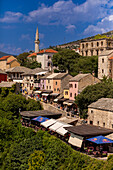 Buildings along the Neretva River in Mostar, Mostar, Bosnia and Herzegovina, Europe