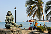 Monument depicting indigenous Tairona people on the seaside promenade of Santa Marta, department of Magdalena, Caribbean Region, Colombia, South America