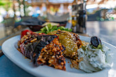 View of stuffed peppers in restaurant in Thassos Town, Thassos, Aegean Sea, Greek Islands, Greece, Europe