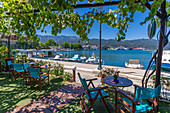 View of restaurant and harbour in Thassos Town, Thassos, Aegean Sea, Greek Islands, Greece, Europe