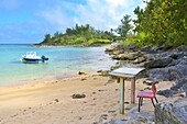 Table and chair at Devonshire Bay, Devonshire Bay National Park, Devonshire, Bermuda, Atlantic, North America