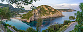 View of coastline from Monastery of Paleokastritsa at sunset, Palaiokastritsa, Corfu, Ionian Sea, Greek Islands, Greece, Europe