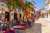 View of cafes and restaurants in Gaios Plaza de l'Ascension in Gaios Town, Paxos, Ionian Sea, Greek Islands, Greece, Europe