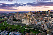 Aerial drone view of traditional old village with iconic monuments at sunset, Anghiari, Tuscany, Italy, Europe