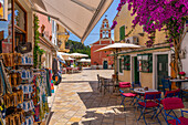 View of cafes and restaurants in Gaios Plaza de l'Ascension in Gaios Town, Paxos, Ionian Sea, Greek Islands, Greece, Europe