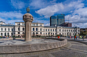 View of Sun and Earth and Grand Central Hotel in Christian Frederiks Plass, Oslo, Norway, Scandinavia, Europe