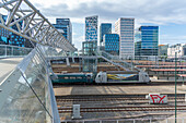 View of the Barcode buildings and Akrobaten bridge on a sunny day, Oslo, Norway, Scandinavia, Europe