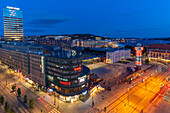 View of Jernbanetorget and city skyline from elevated position at dusk, Oslo, Norway, Scandinavia, Europe