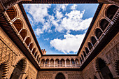 Ultra wide angle of Moorish architecture in courtyard and patio of the Real Alcazar, UNESCO World Heritage Site, Seville, Andalusia, Spain, Europe