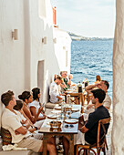 People at restaurant, Chora (Mykonos Town), Mykonos, Cyclades, Greek Islands, Greece, Europe