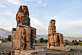 Colossi of Memnon, massive stone statues of Pharaoh Amenhotep III in the Theban Necropolis, UNESCO World Heritage Site, Luxor, Egypt, North Africa, Africa