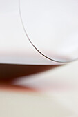 Extreme close up of a glass of red wine