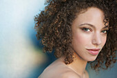 Portrait of Young Woman with Curly Hair