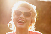 Smiling Young Woman Outdoors, Close-up View