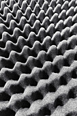 Close up full frame textured gray acoustic foam