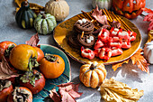 Halloween-themed display with sweets and seasonal decor