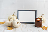 Interior design with autumn fall decor and picture frame mockup.