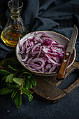 Process of fermenting red onions with spices and oil