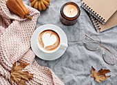 Fall flat lay with coffee and autumn decor