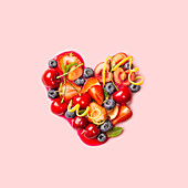 Heart-shaped Assortment of Healthy Fruits and Vegetables