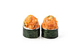 Close-up of savoury salmon sushi rolls on a white background