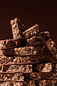 Stack of chocolate nougat bars and puffed rice in close-up