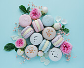 Delicious macaroons with beautiful roses