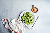 Bird's eye view of fresh cucumber salad with dill