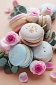 Delicious macaroons with beautiful roses