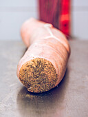 Close-up view of traditional Sobrasada sausage on metal surface