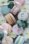 Beautiful colourful delicious macaroons on a concrete background