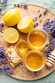 Jar with honey and fresh lavender flowers