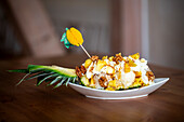 Pineapple boats filled with ice cream and fresh toppings