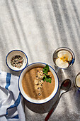 Healthy dinner set with mushroom cream soup and apple water