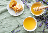 Jar with honey and fresh lavender flowers