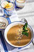 Healthy mushroom cream soup and apple water dinner set