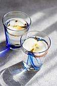 Apple water in glass with organic apple vinegar and apple slices