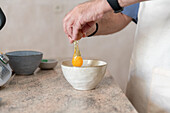 Preparing a traditional Epiphany cake in the kitchen