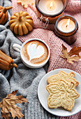 Fall flat lay with coffee and autumn decor